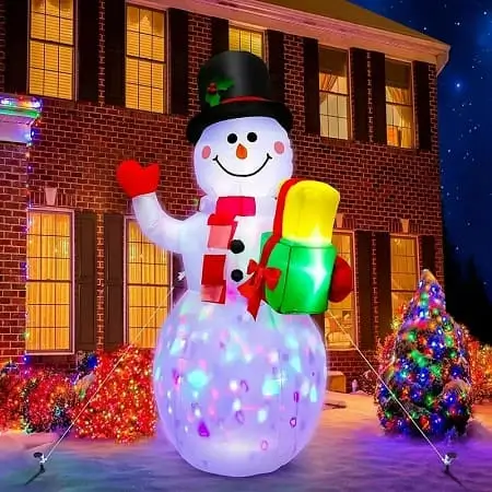 Decoración navideña inflable de muñeco de nieve a $542 en Temu